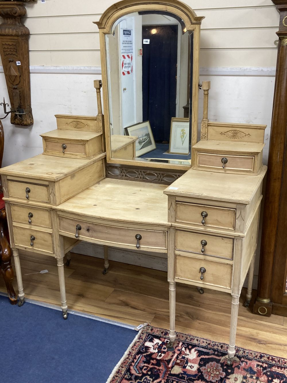 An Edwardian pine dressing table, width 136cm depth 58cm height 166cm